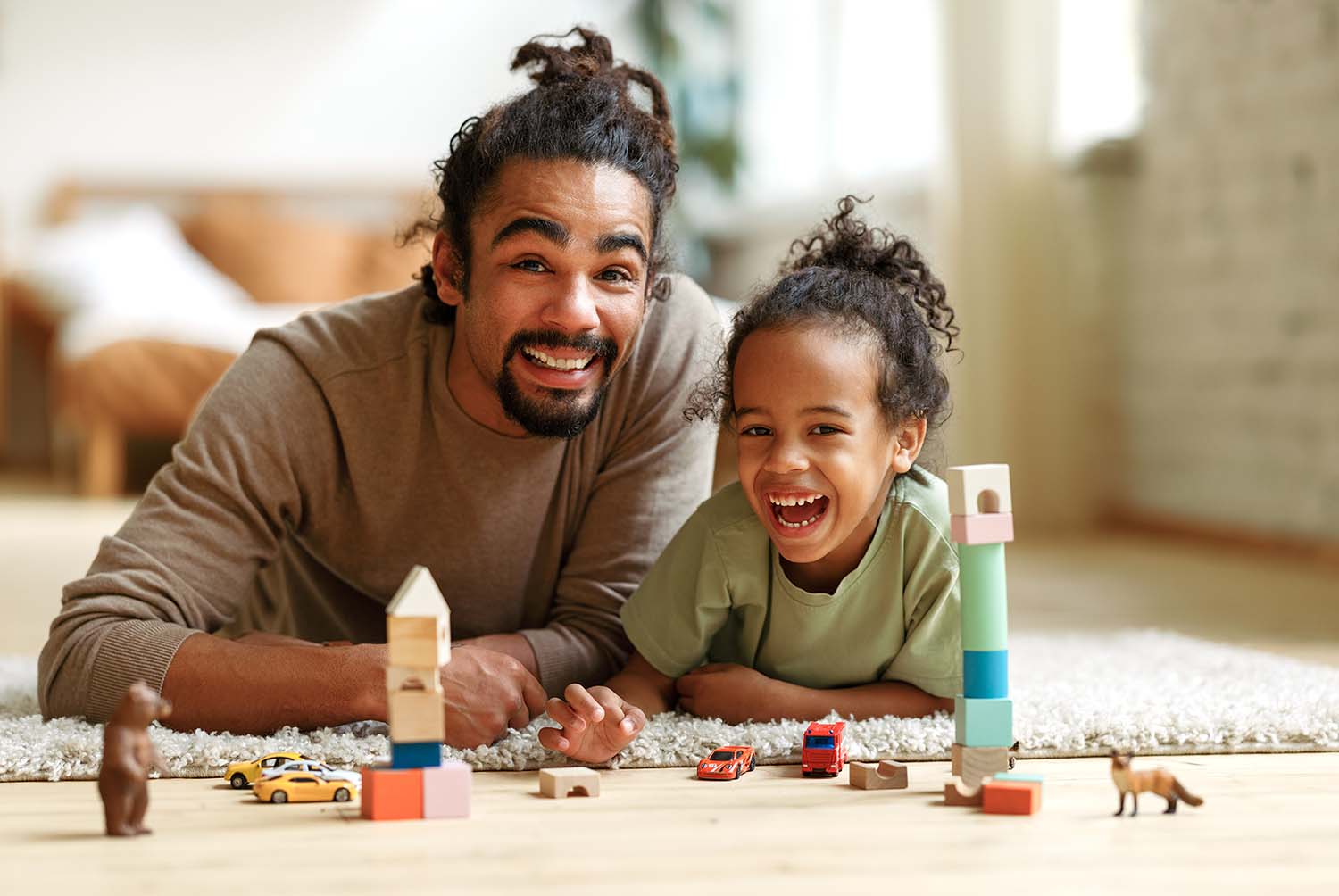 Photo of father and son playing